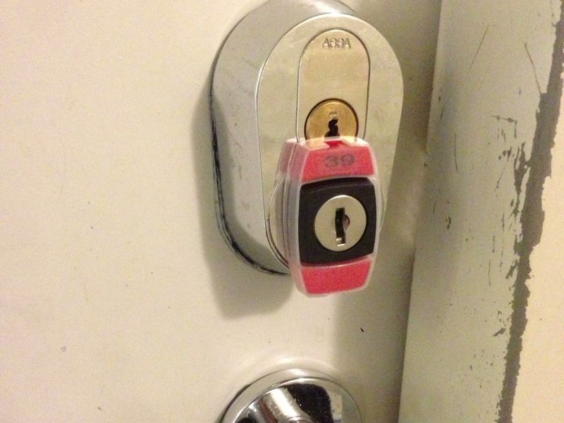 Front door fitted with a modern cylinder lock
